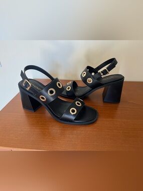 12Thompson  “Julia” black block heel sandals with gold accents. Size 8